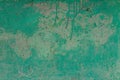 Old texture turquoise blue cracked wall, the old paint texture is chipping and cracked fall destruction. Grunge wall texture. Royalty Free Stock Photo