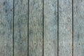 Old textured discoloured wooden boards Old textured discoloured wooden boards arranged vertically