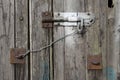 Old textured wood and bolt on an old shed Royalty Free Stock Photo