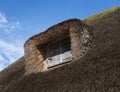 Old Thatched Roof Dormer Window