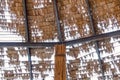 The old thatched roof leaked holes and was damaged by the storm..View of natural thatched roof with hole. The ceiling of old Royalty Free Stock Photo