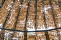 The old thatched roof leaked holes and was damaged by the storm..View of natural thatched roof with hole. The ceiling of old Royalty Free Stock Photo