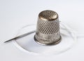 Old Thimble and a Needle Royalty Free Stock Photo