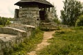 Old thrown stone fireplace for a fire.