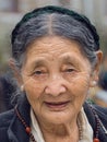 Old Tibetan Buddhist woman in the Dharamsala, India