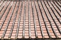 Old tile roof texture. Weathered surface of ancient roof Royalty Free Stock Photo