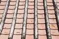 Old tile roof texture. Weathered surface of ancient roof Royalty Free Stock Photo