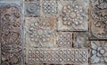 Old tile texture of metal flowers rusting away