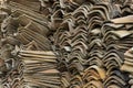 Old tiled roof stacked for restoration. Background. Selective focus