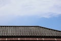 Old tiled roof, vintage house, sky background, copy space available for you to put text. Royalty Free Stock Photo