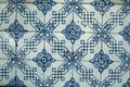 Old tiles wall on the street Portuguese painted tin-glazed, azulejos ceramic tile-work. Porto