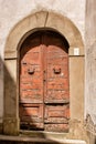 Old timber door and arched entrance Royalty Free Stock Photo