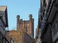 Old timber framed tudor style buildings and the cathedral in St Werburgh street Chester Royalty Free Stock Photo