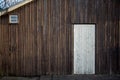 Old timber wall with timber door Royalty Free Stock Photo