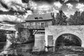 the old mill bridge at vernon in france over the river seine Royalty Free Stock Photo