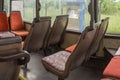 Old time bus cabin with old seats Royalty Free Stock Photo