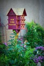 Birdhouse & Garden Royalty Free Stock Photo