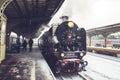 Old locomotive stopped at the station. Retro train on Vitebsky railway station in Saint-Petersburg, Russia, 25 february 2018