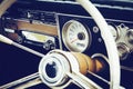 Old timer car steering wheel and dashboard Royalty Free Stock Photo