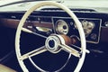 Old timer car steering wheel and dashboard Royalty Free Stock Photo