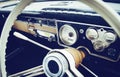 Old timer car steering wheel and dashboard Royalty Free Stock Photo
