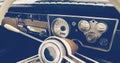 Old timer car steering wheel and dashboard Royalty Free Stock Photo