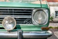 Old timer classic green car front headlight Royalty Free Stock Photo