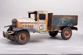 isolateded old tin cargo truck toy from the year 1950 faded profile Royalty Free Stock Photo