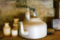 Old tin kettle and earthenware pots and jugs