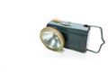 Old tin and plastic pocket flashlight close up Royalty Free Stock Photo