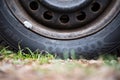 Old tire - tyre on ground detail