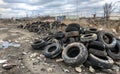 Old tires dumped in the junkyard Royalty Free Stock Photo