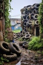 old tires stacked in an abandoned dumpsite Royalty Free Stock Photo