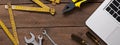 Old tools and computer on wooden table Royalty Free Stock Photo