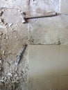 Old tools on floor. Dismantling old floor tiles. Renovations.Chisel and hammer on concrete slab. Very old construction Royalty Free Stock Photo