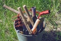 Old tools for gardening. Bucket, shovel, garden shears and others