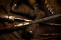 Old tools scattered on a bench