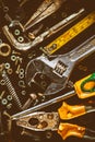 Old tools and screws on a metallic background Royalty Free Stock Photo