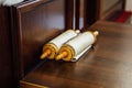 Old Torah scroll book in synagogue, Jewish book of Tora Royalty Free Stock Photo