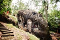 Old torajan burial site in Bori, Tana Toraja. The cemetery with coffins placed in a huge stone. Indonesia, Rantapao, Sulawesi Royalty Free Stock Photo