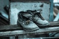 Old torn shoes. Street style. Royalty Free Stock Photo