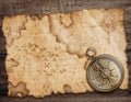 Old torn treasure map with compass . Adventure and travel concept. Mixed media.