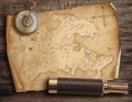 Old torn treasure map with compass and spyglass. Adventure and travel concept. 3d illustration.