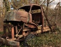 an old tow truck in the forest Royalty Free Stock Photo