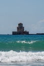 Old tower in fort and historical castle in ancient picturesque town Methoni on Peloponnese, Greece, tourist destination Royalty Free Stock Photo