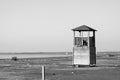 Old tower for lifeguards on the deserted beach Royalty Free Stock Photo