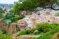 Old tower and stone fortress walls against background of resort town of Tossa de Mar, Costa Brava, Spain Royalty Free Stock Photo