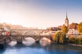 Old town of Bern, UNESCO, Switzerland with two bridges, river and church in early colorful autumn morning