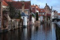 Old town Brugge Bruges, Belgium. Vintage architecture. Medieval brick buildings and bridge at canal street . Royalty Free Stock Photo