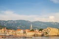 The Old Town Budva, Montenegro. Beautiful blue sky with clouds over the roofs of the city on the Adriatic Sea Royalty Free Stock Photo